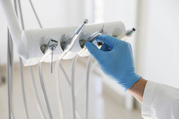 Professional Emergency Dentist technician working in East Village, CT